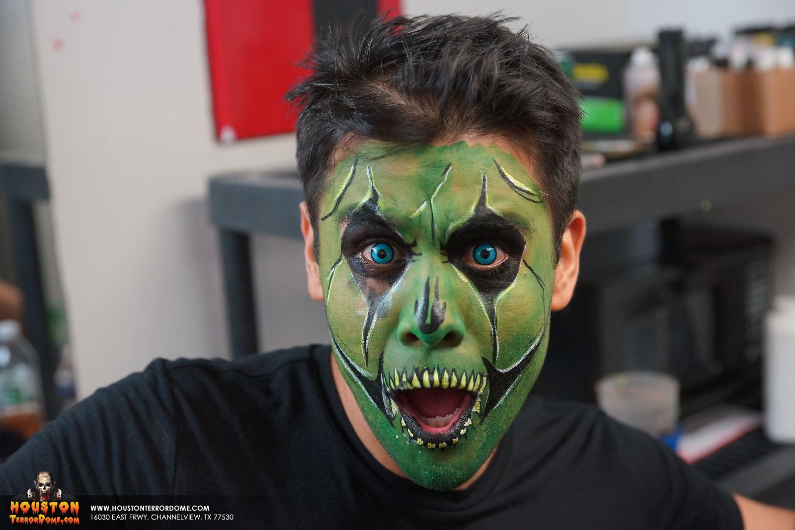 Ruben Galvan of Channel 2 KPRC tests his haunted game face with blue contact lenses
