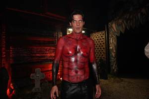 Devil Shows off his airbrushed Abs