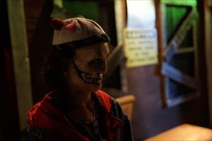 Skull actor waiting for his dinner to arrive at the Houston TerrorDome 