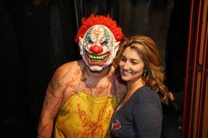 Evil clown and a beautiful supporter. 
