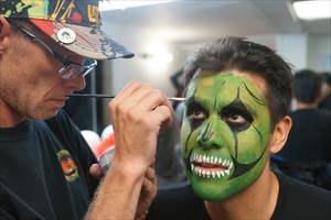 Ruben Galvan of Channel 2 KPRC getting some final details painted at Houston Terror Dome Haunted House